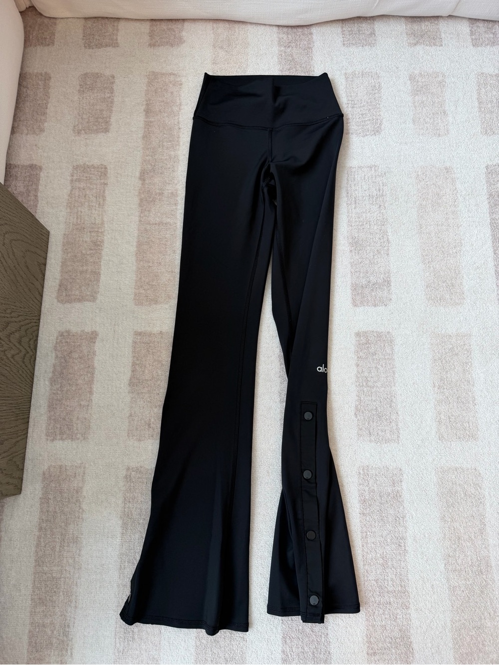 ALO Yoga Black High-Rise Flare Leggings with Snap Hem